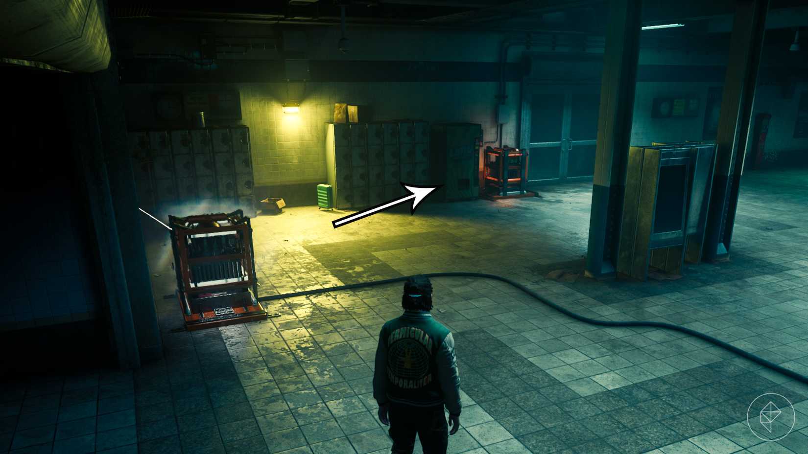 Dylan standing in front of a charged power core and an uncharged power core in a subway station in Control Resonant.