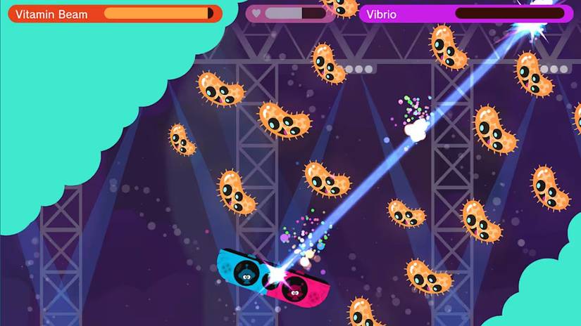 Vita-Boy and Mina-girl fly in a JoyCon-shaped spacecraft, blasting pathogens.