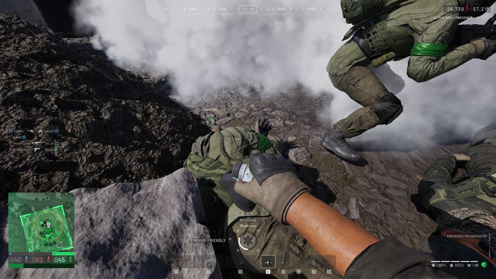 The player in Wardogs using a resuscitator on a downed ally.