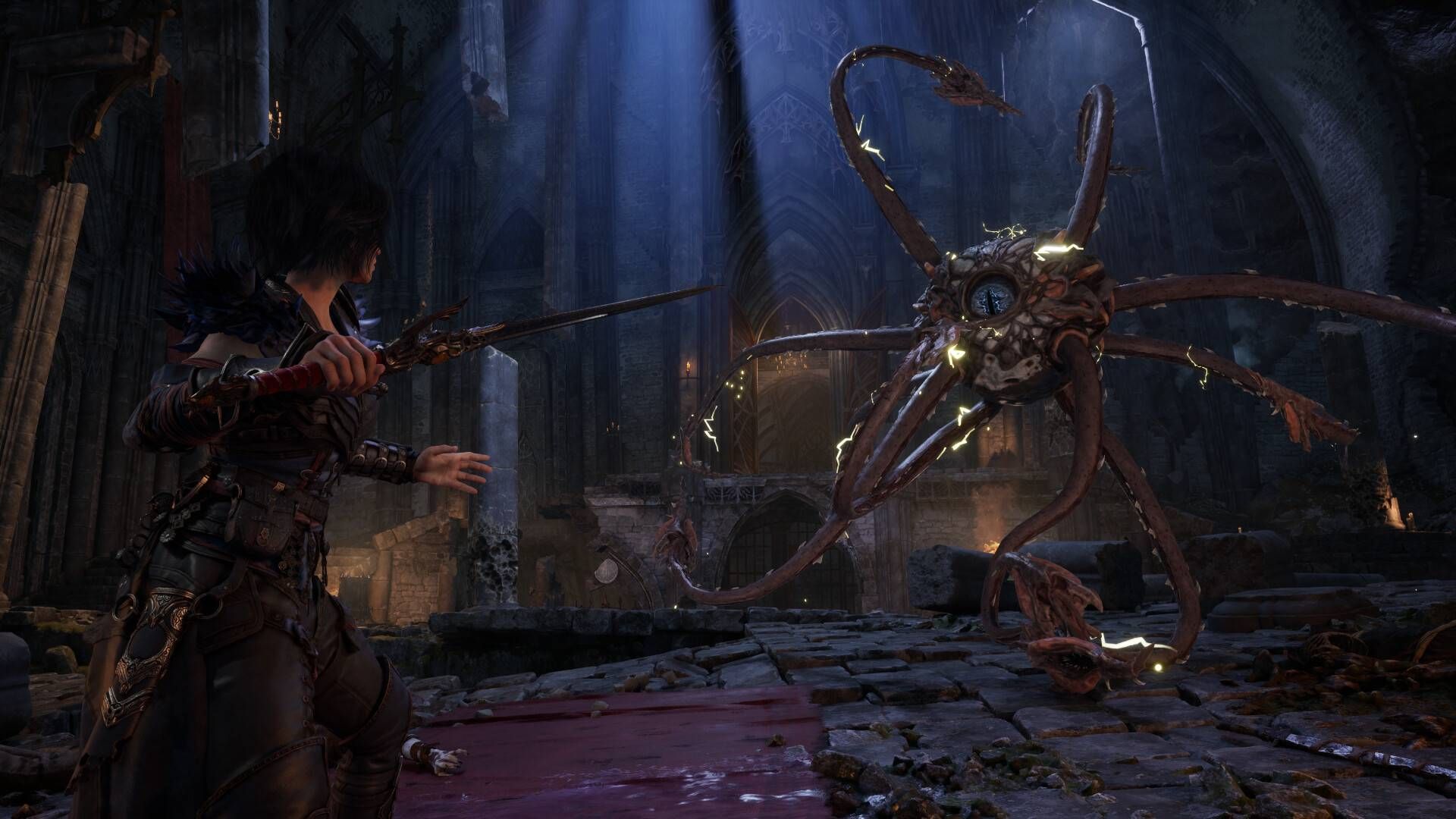 Kaatri fighting a huge eyeball with tentacles in Warlock.