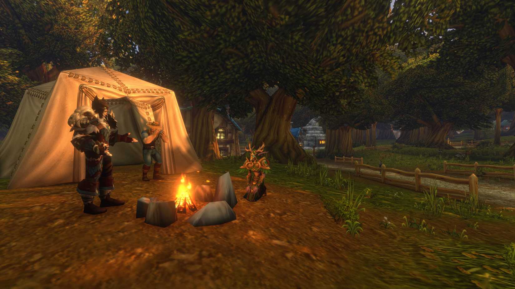 Alliance players gather round a camping campfire