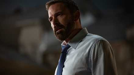 Ben Affleck with a beard looking slightly confused