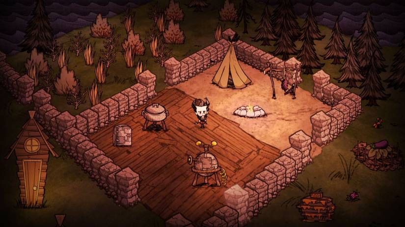 In a Don't Starve screenshot, the protagonist stands near a campfire with stone walls and a tent nearby, set within the middle of a forest clearing.