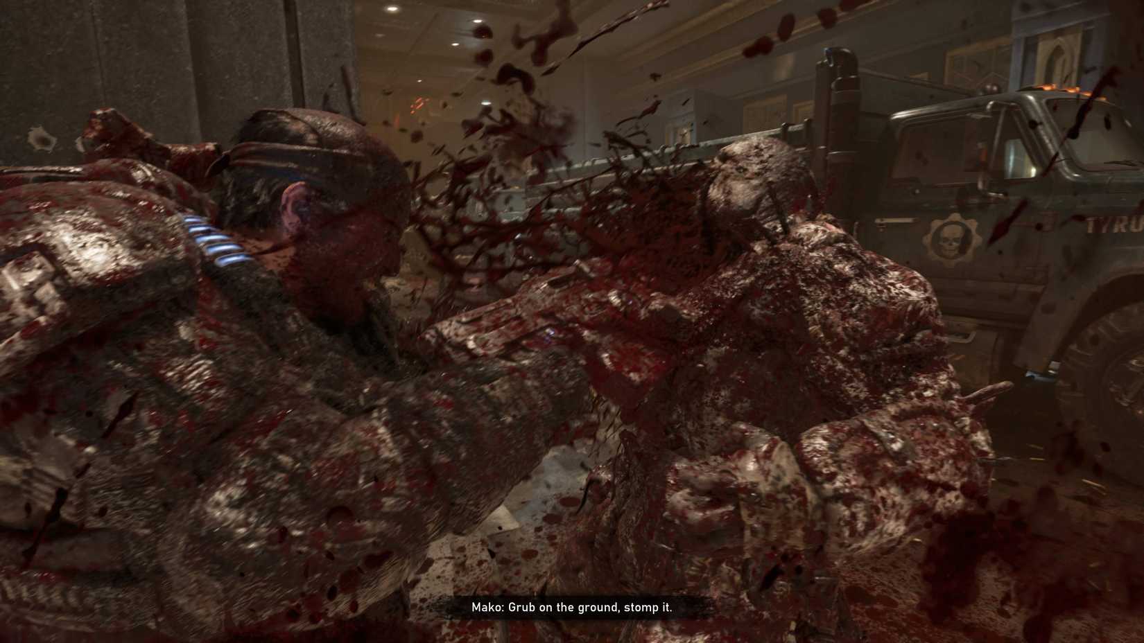 Marcus Fenix chainsawing a Locust drone in half in Gears of War: E-Day.