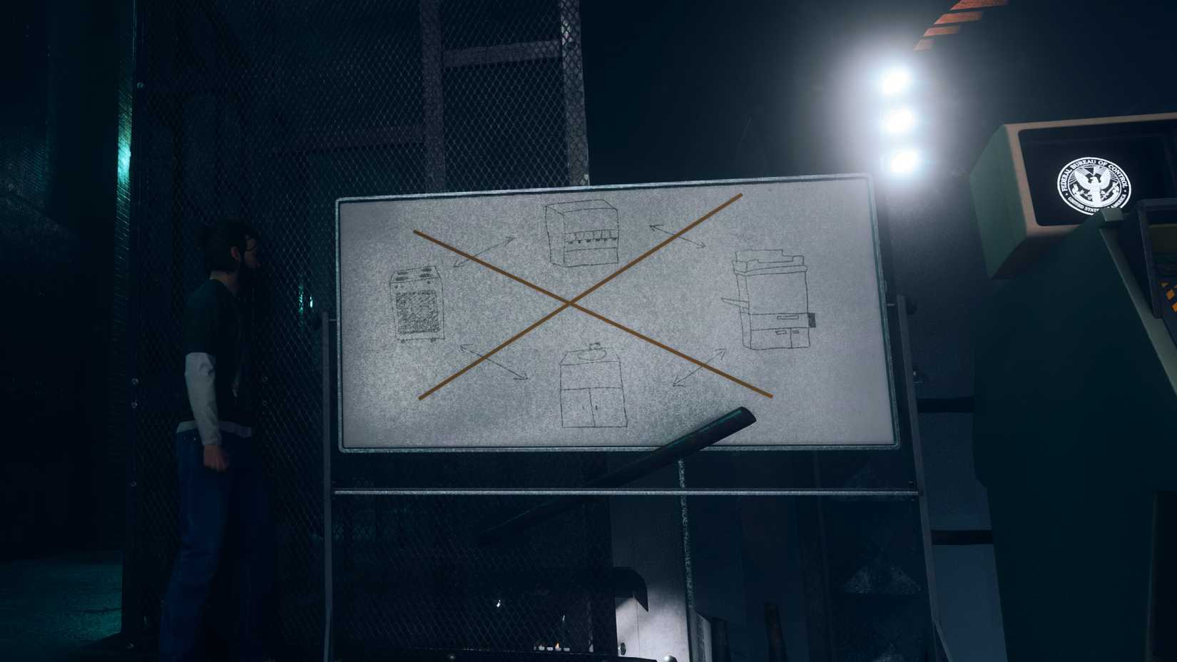 Dylan looking at a white board with a stove, sink, soda dispenser, and a copy machine on it in Control Resonant.