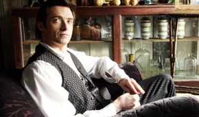 the prestige hugh jackman seated