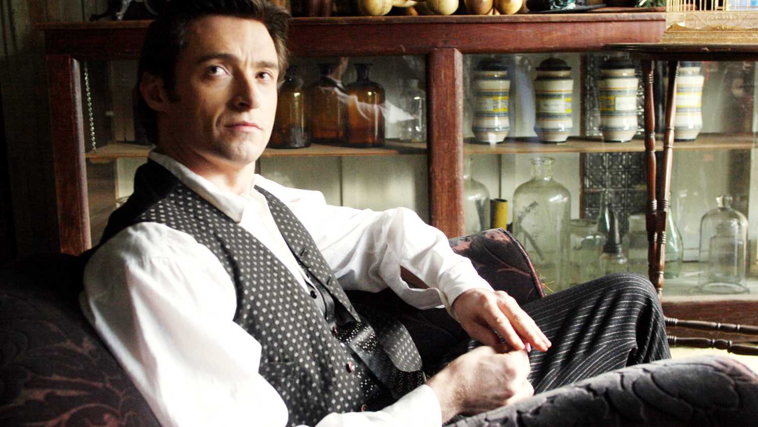 the prestige hugh jackman seated