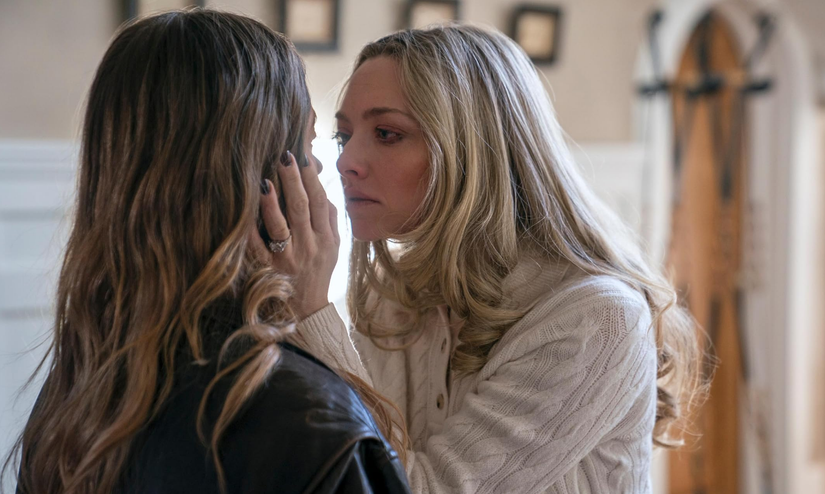 Nina grabs Millie's jaw in The Housemaid