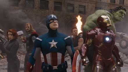 The Avengers (2012) - the Avengers looking up from a Manhattan street