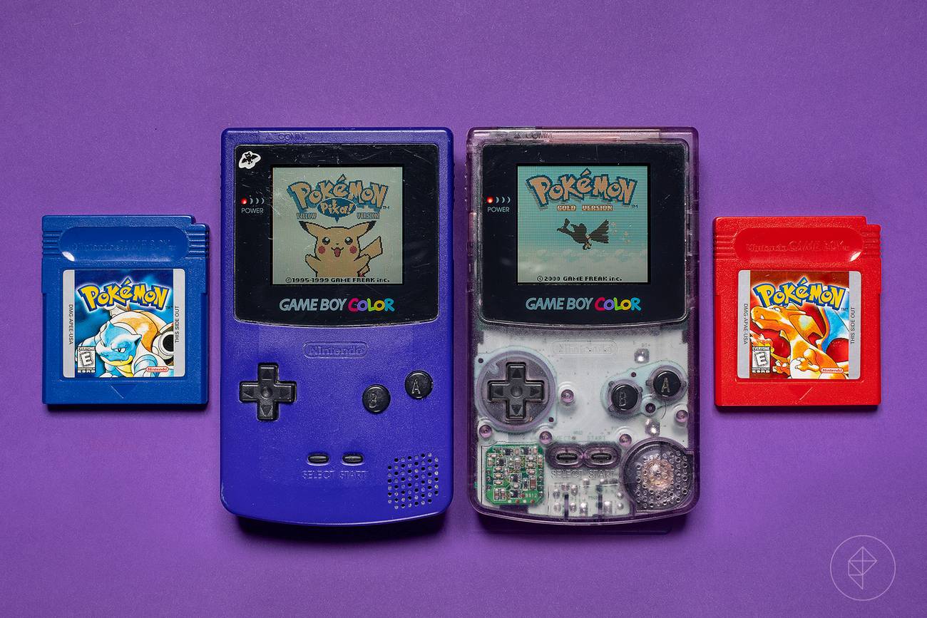 Vintage Pokemon Red and Blue versions displayed on a Game Boy Color