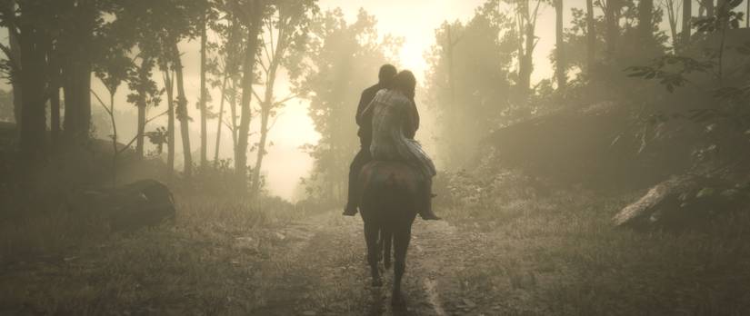 Red Dead Redemption 2 - Arthur and a woman ride through hazy morning sunlight