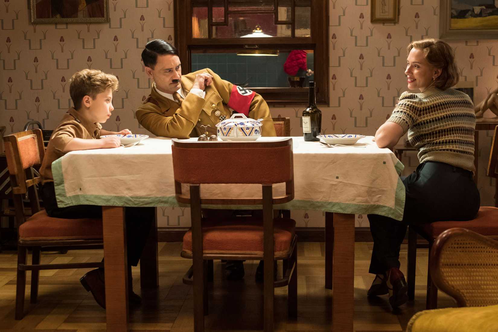 Jojo Rabbit - Jojo, Adolf Hitler, and Jojo’s mother at the dinner table