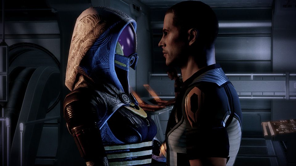 Tali and Shepard stand close together on the Normandy.