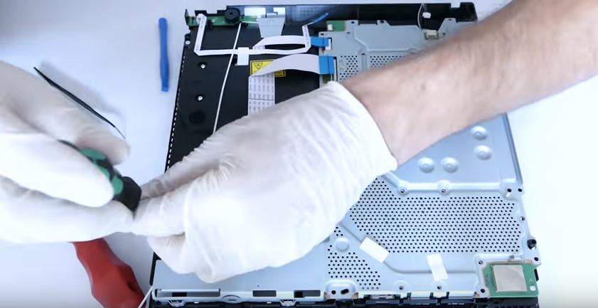 Watch the PlayStation 4 slim completely disassembled in this teardown video