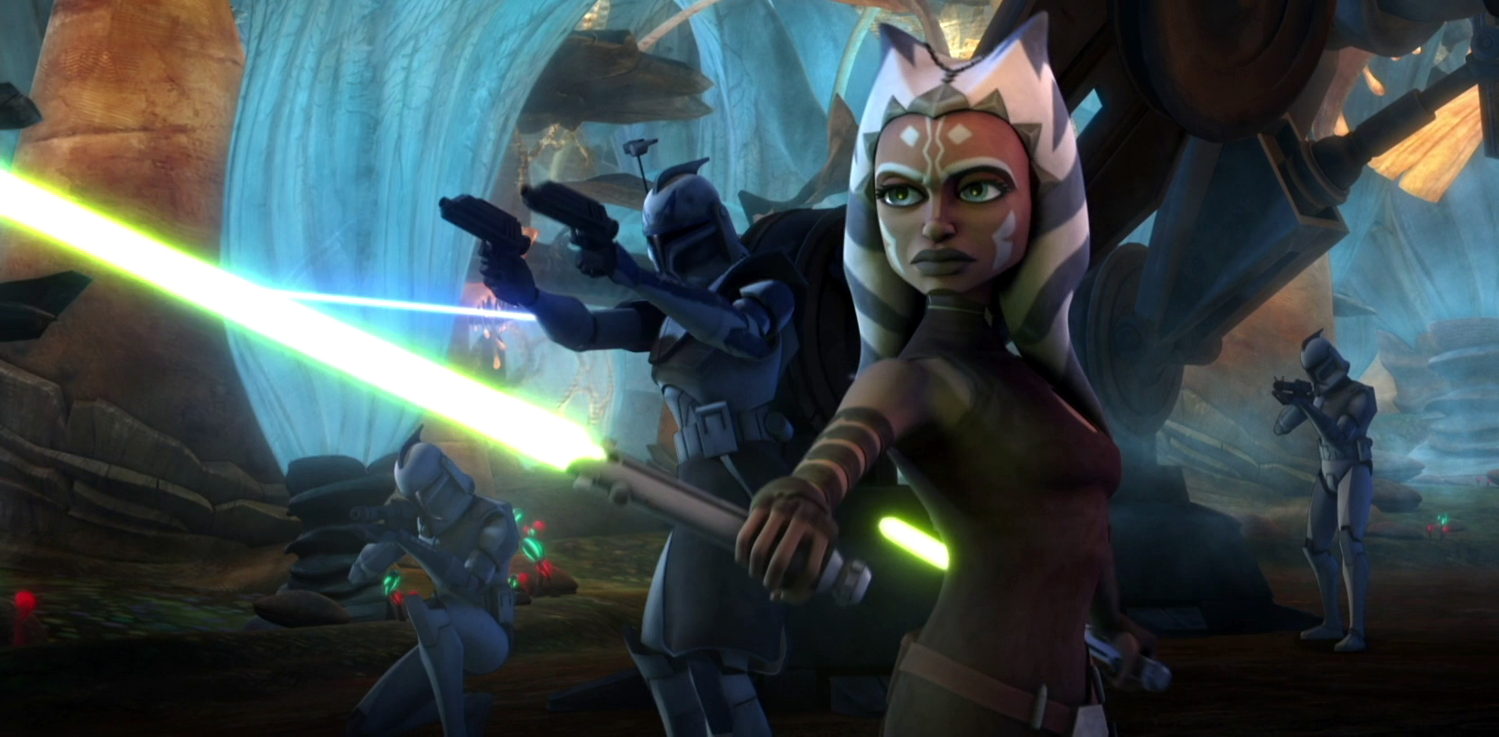 Ahsoka tano holds out a green lightsaber in star wars: the clone wars
