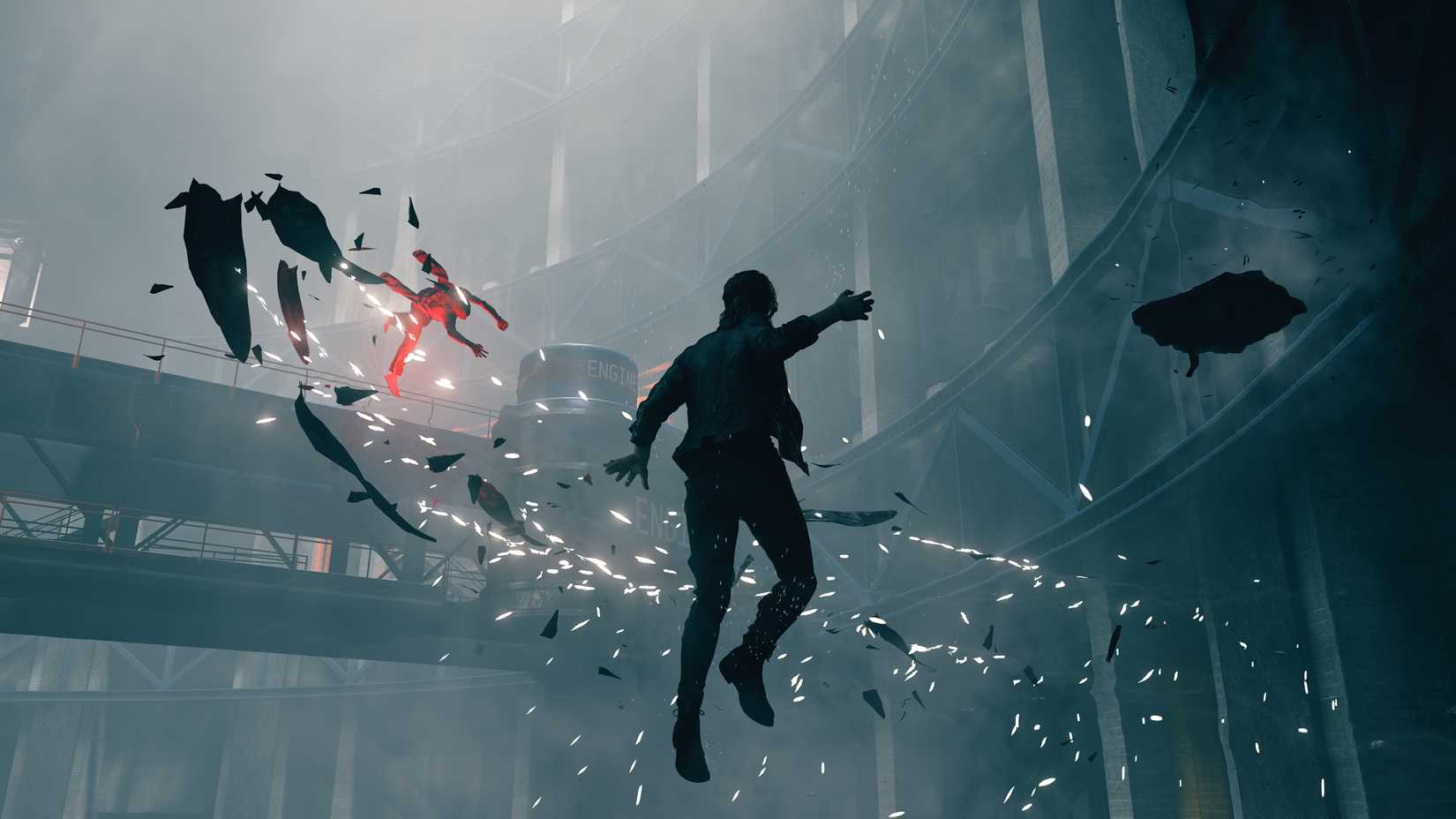 The protagonist of Control hovering mid-air in a screenshot from the gameplay trailer