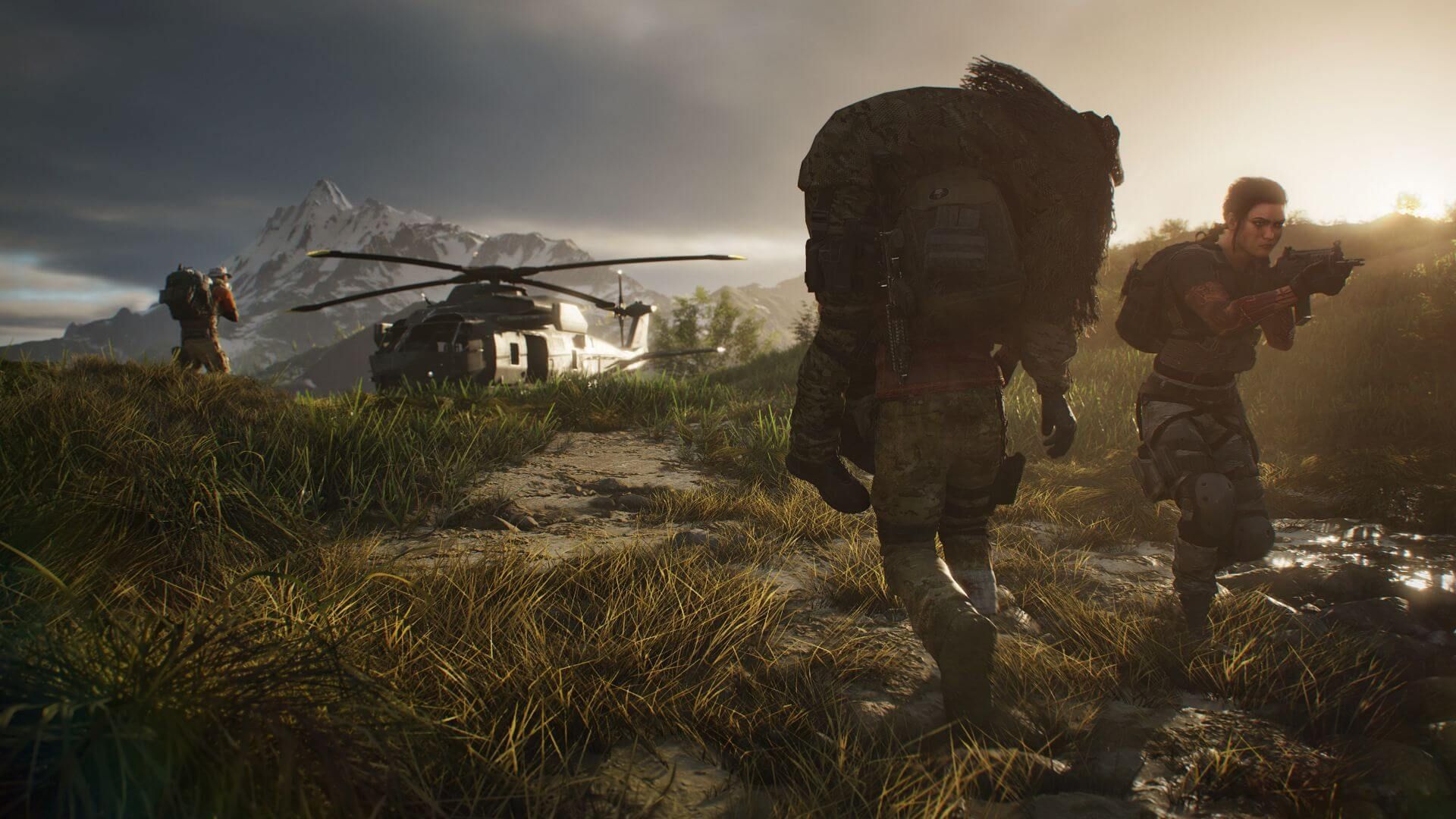 A soldier carries a wounded comrade in a ghillie suit back to a helicopter in Ghost Recon: Breakpoint