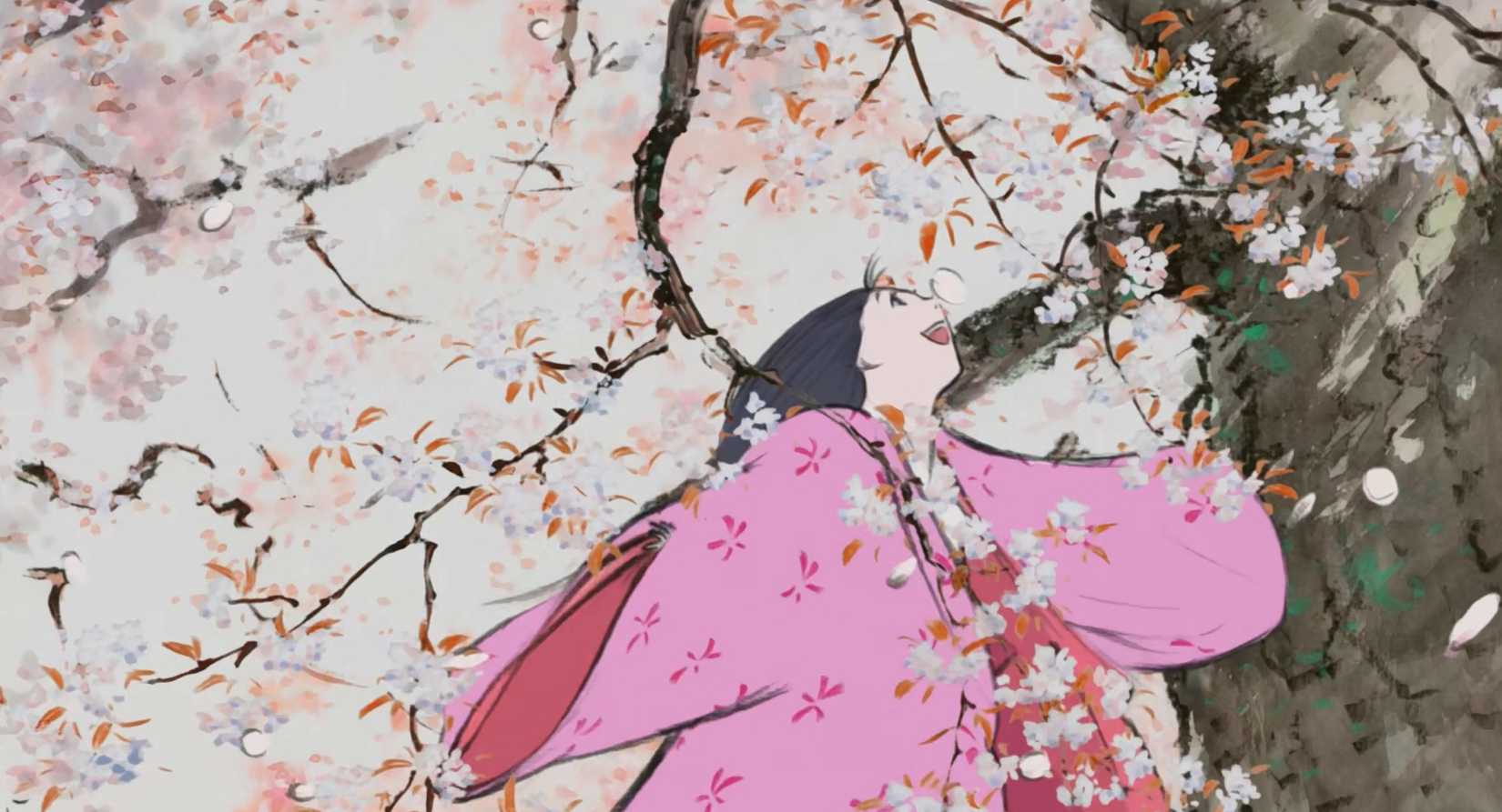 A scene from the anime film The Tale of the Princess Kaguya, a dark-haired girl in pink robes plays with the branches of a flowering tree