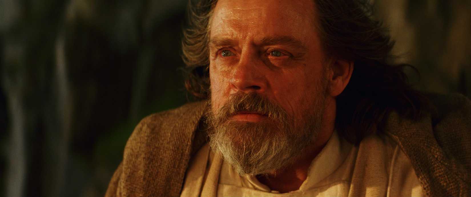Old Luke Skywalker (Mark Hamill) in close-up, with tears in his eyes, in Star Wars: The Last Jedi