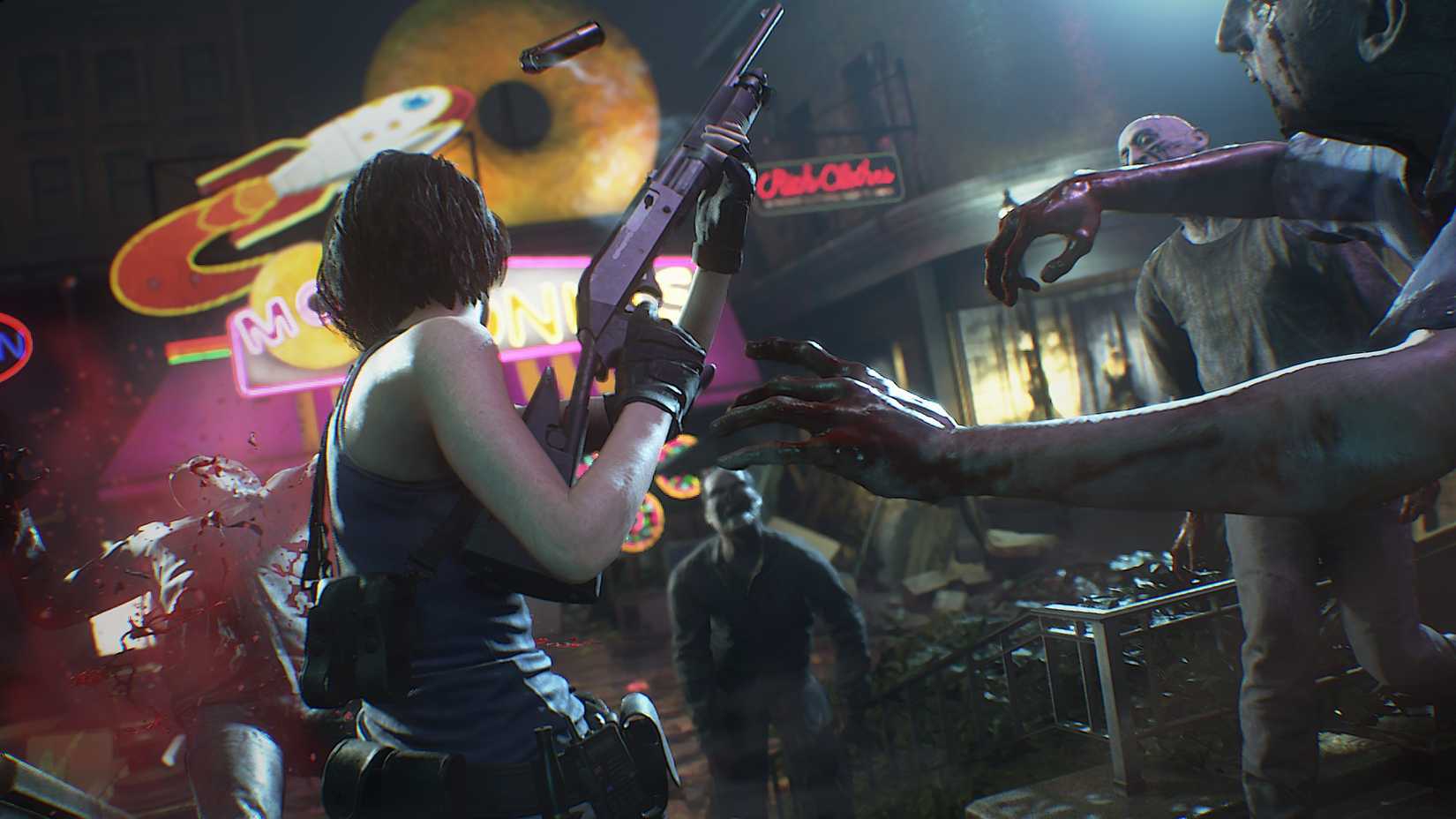 Jill Valentine reloads a shotgun while being pursued by zombies in a screenshot from Resident Evil 3 (2020).