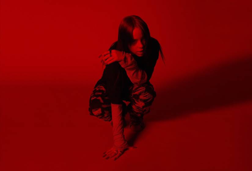 billie eilish in red lighting 