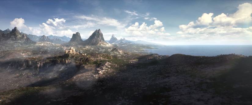 A mountain range next to a body of water in a still from The Elder Scrolls 6 teaser trailer