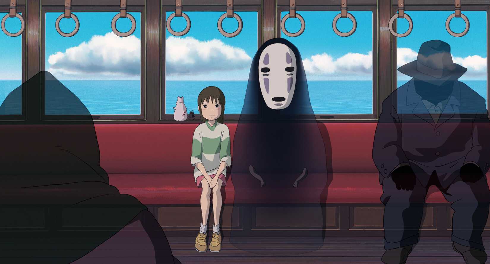 chihiro and no-face on the train in spirited away