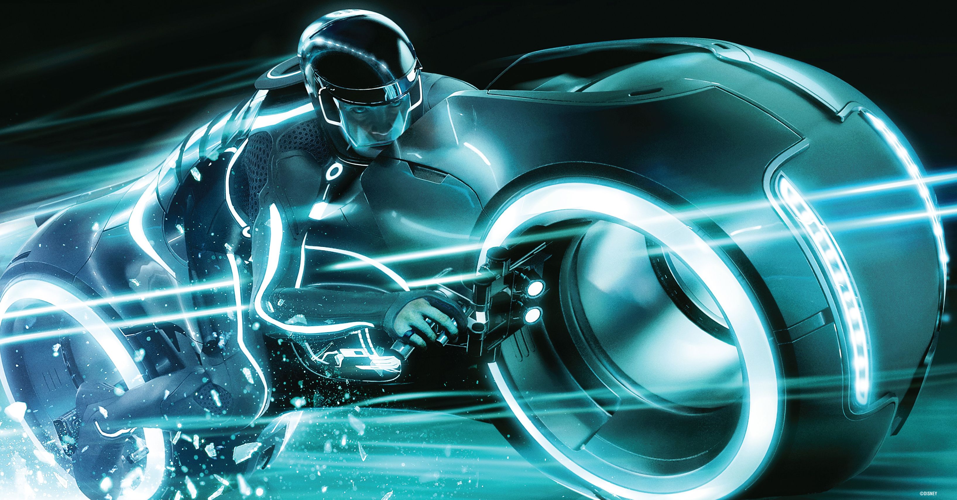 Sam Flynn accelerates through the neon landscape on a lightcycle