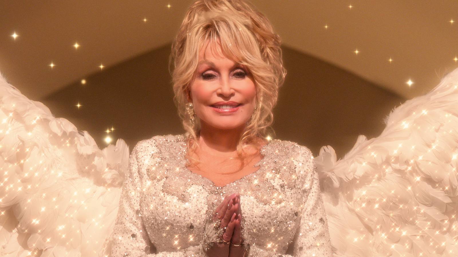 Dolly Parton as a rhinestone-covered angel in Christmas on the Square