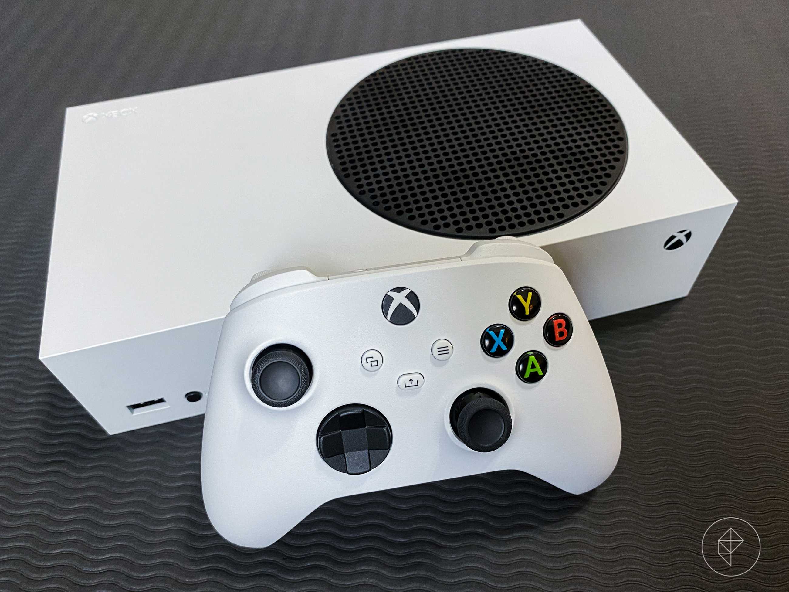 Xbox Series S console and controller, photographed from above