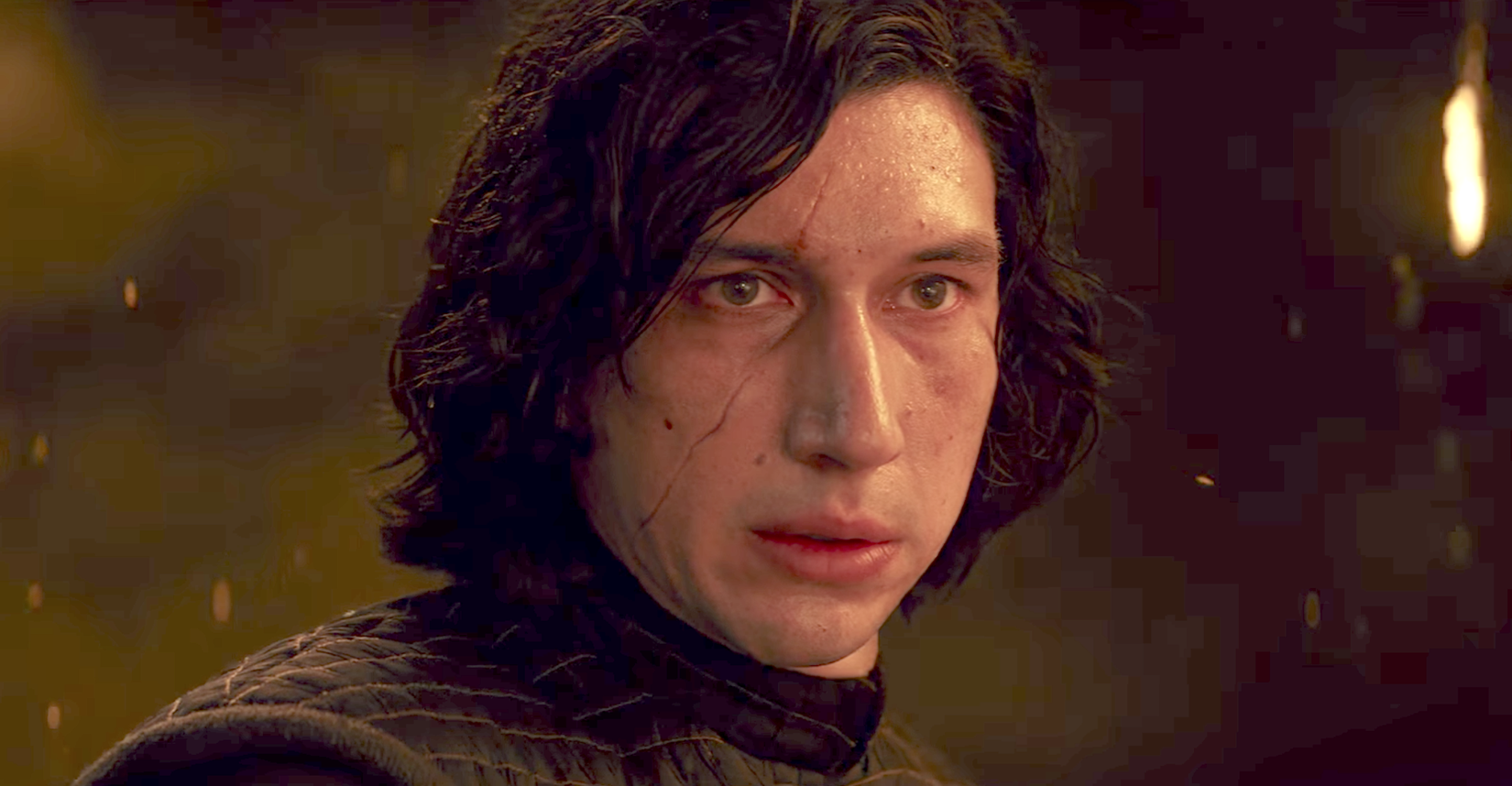 Adam Driver as Kylo Ren, looking extra angsty and in need of redemptive love in Star Wars: The Last Jedi
