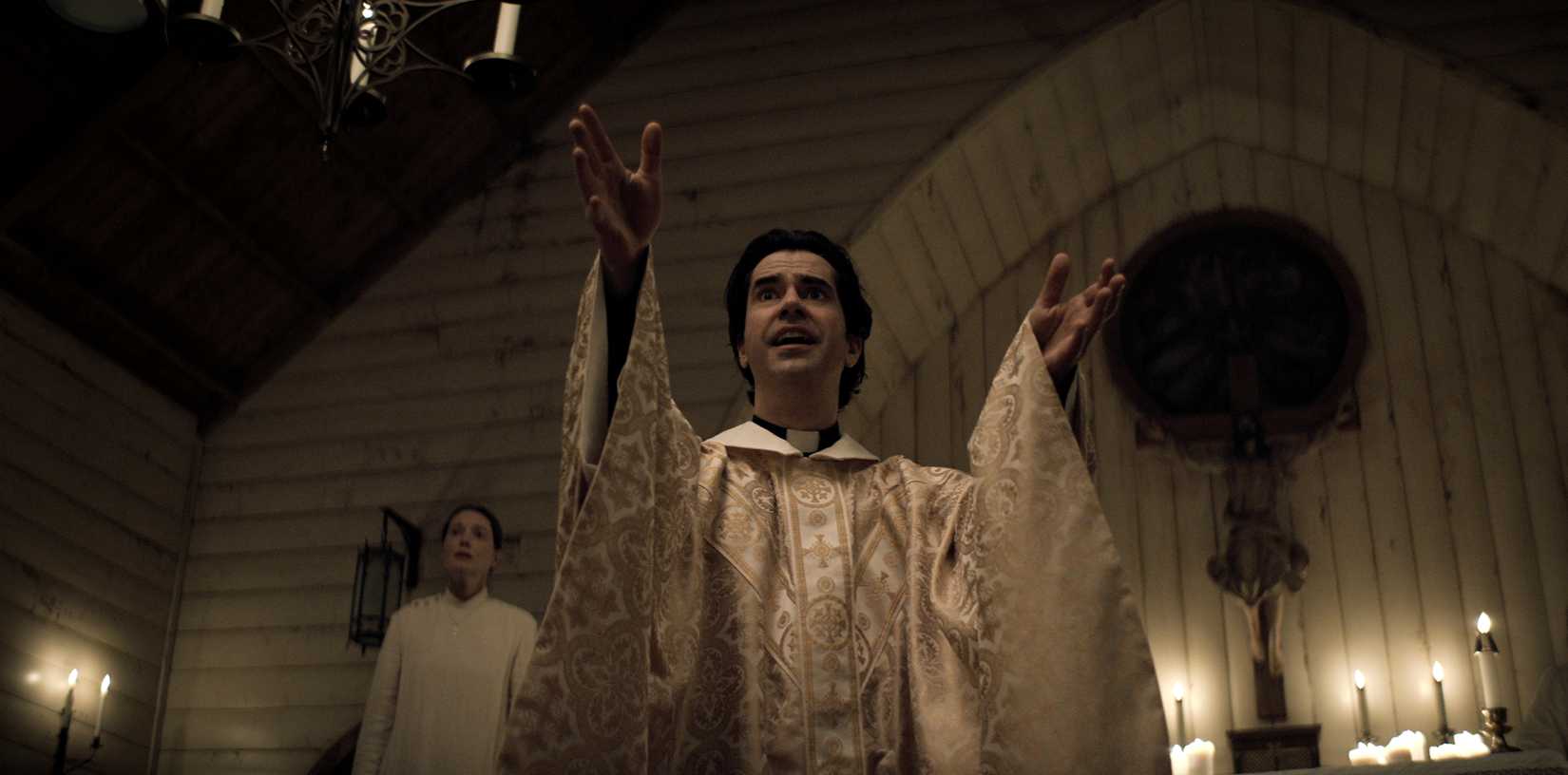 Hamish Linklater holds forth from the pulpit in church in Netflix’s Midnight Mass