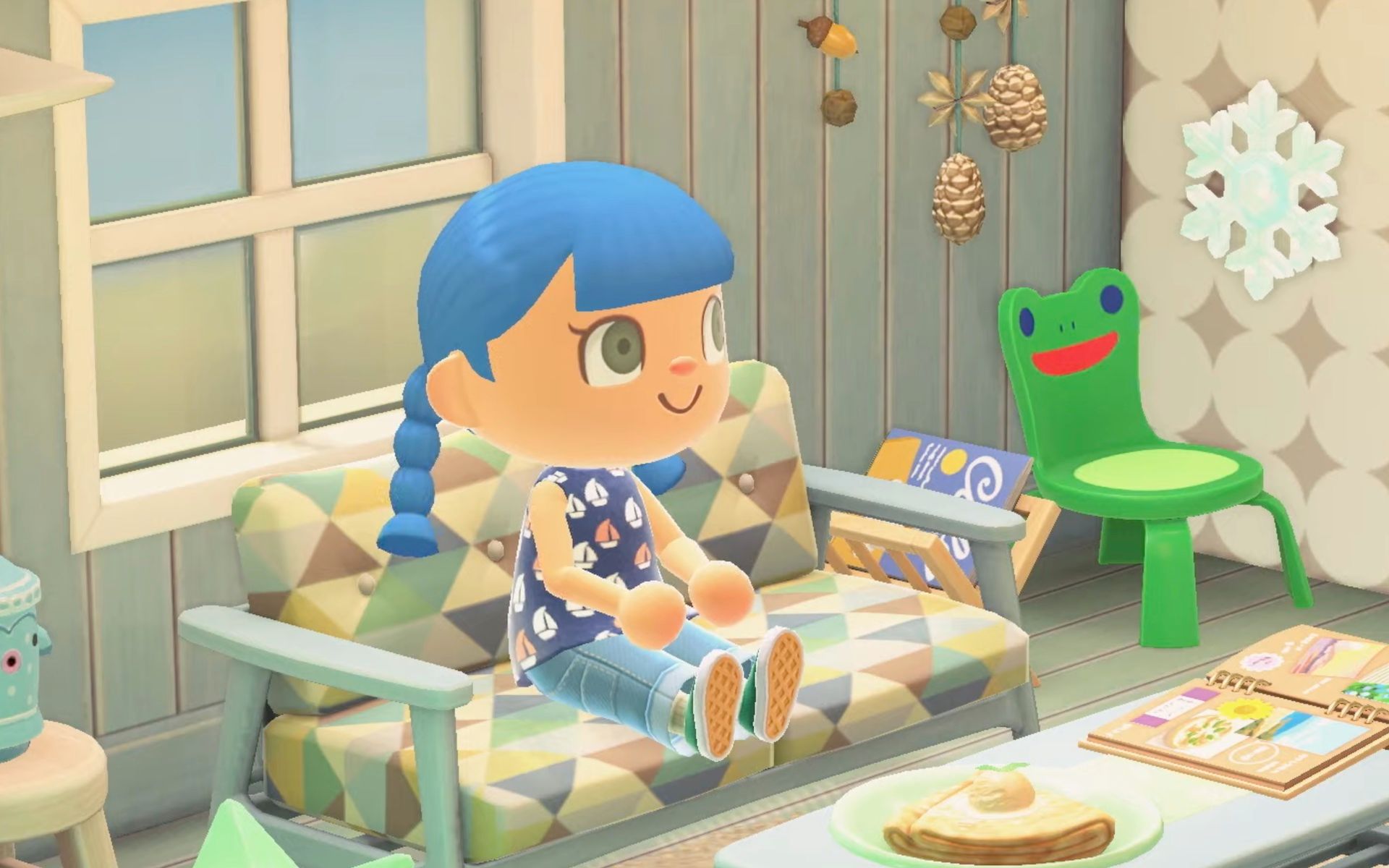 a character with blue hair sitting next to a froggy chair