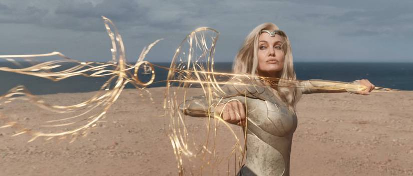 Thena (Angelina Jolie) fighting with cosmic power weapons in Eternals