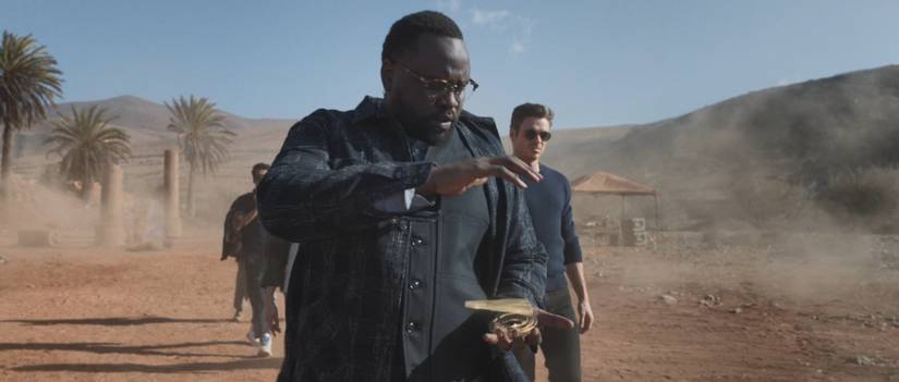 Phastos (Brian Tyree Henry) inventing something to summon a spaceship in Eternals