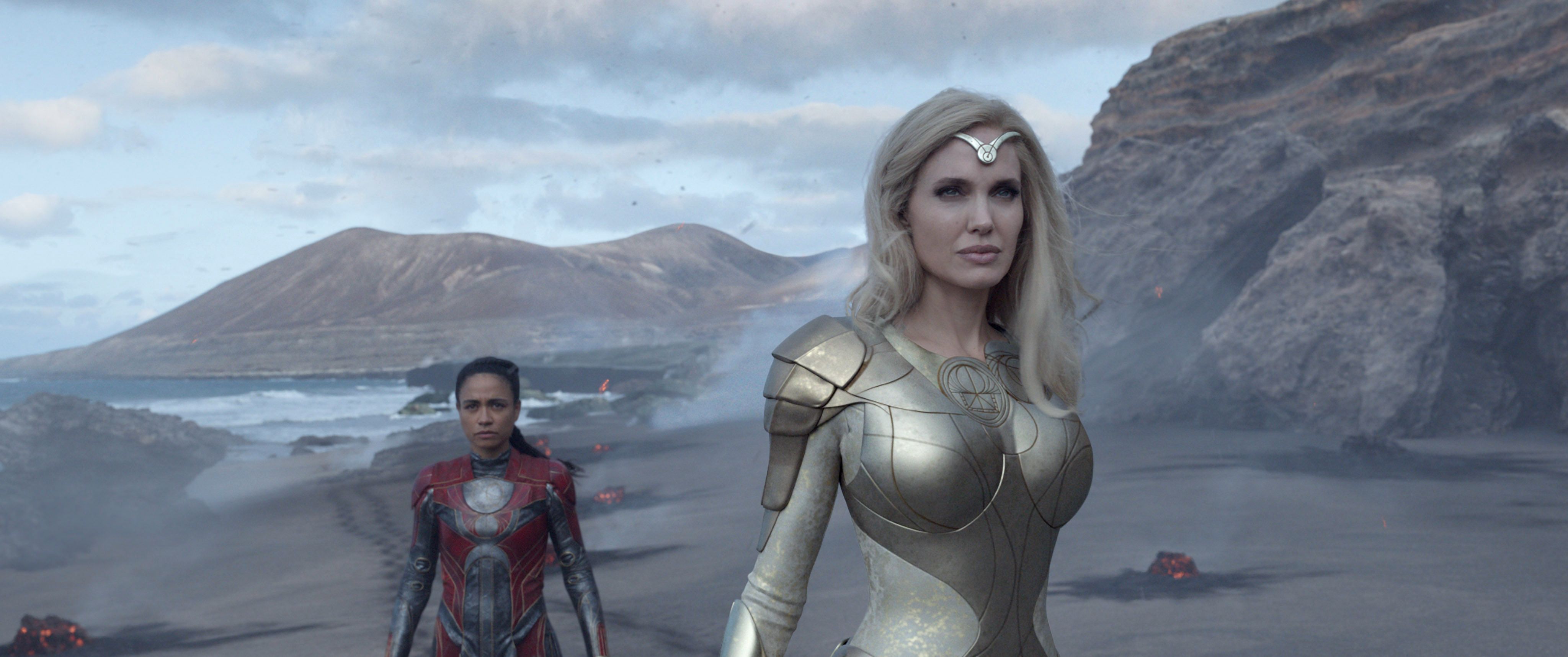Gilgmaesh and Thena staring down Deviants at the beach in Eternals