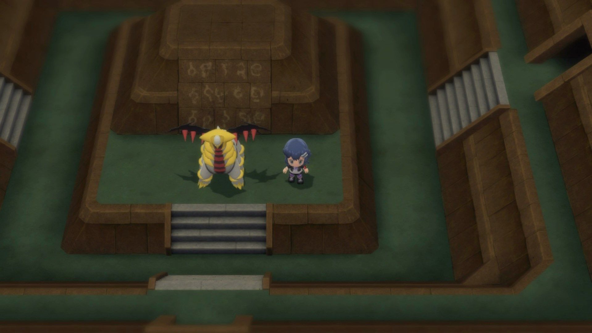 Giratina as it appears in Pokémon Brilliant Diamond and Shining Pearl, sitting in the middle of a dark cave