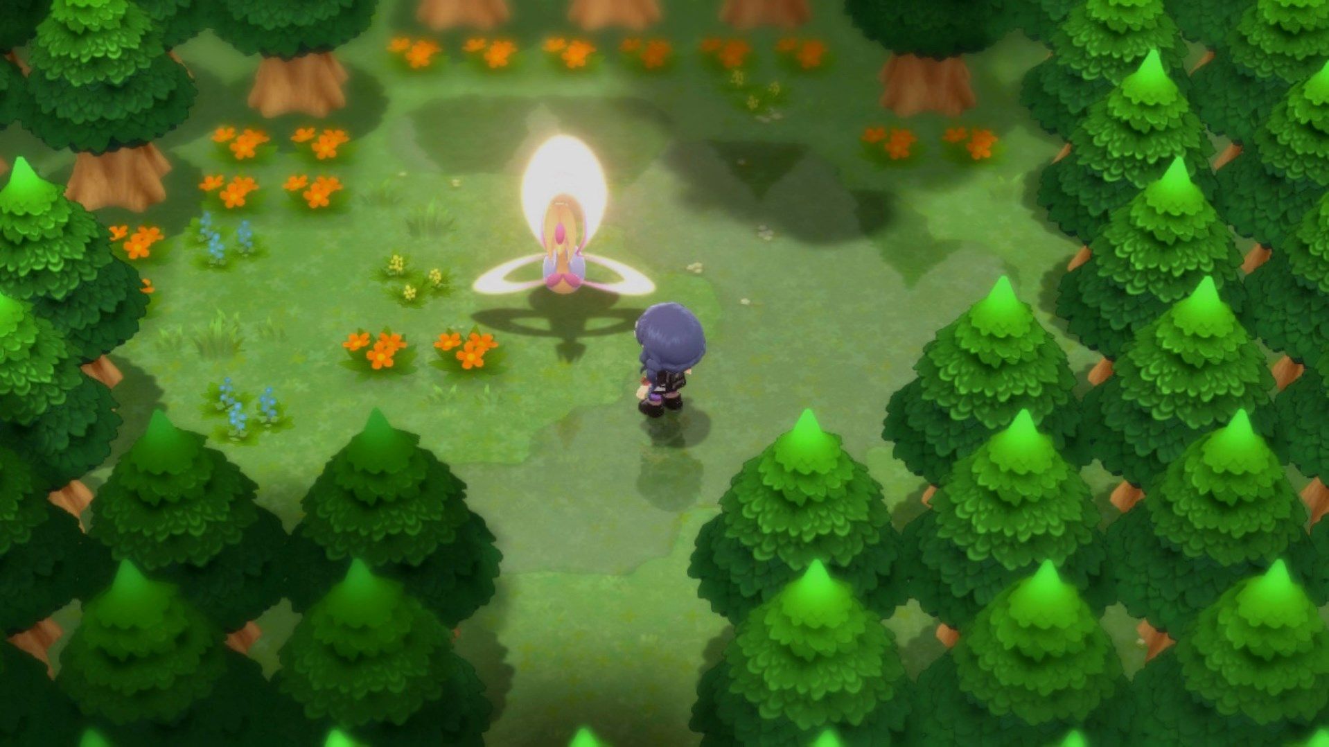 Cresselia sits glowing in the middle of a forest in Pokémon Brilliant Diamond and Shining Pearl