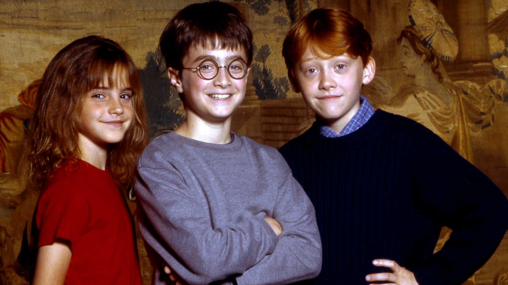 Emma Watson, Daniel Radcliffe, and Rupert Grint in a 2001 publicity image for Harry Potter and the Sorcerer’s Stone, as seen in the Return to Hogwarts special