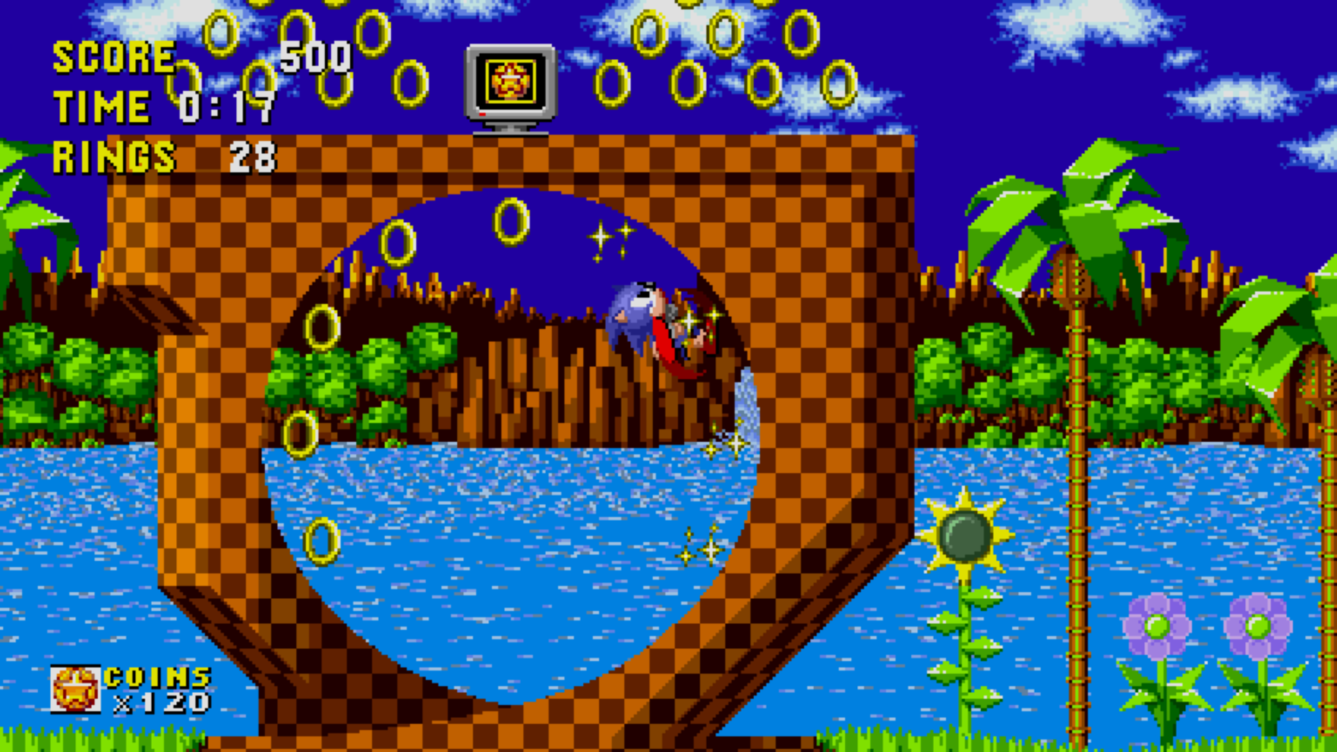A screenshot of Sonic running up a loop in Sonic the Hedgehog from Sonic Origins.