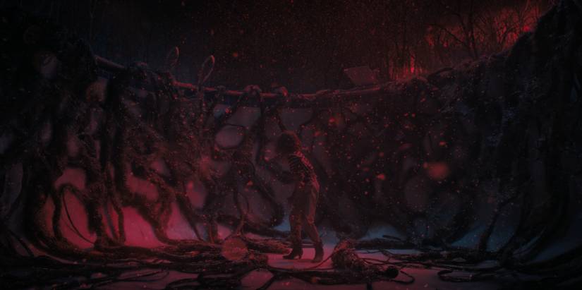 Nancy investigates a vine-covered pool in the Upside Down in Stranger Things