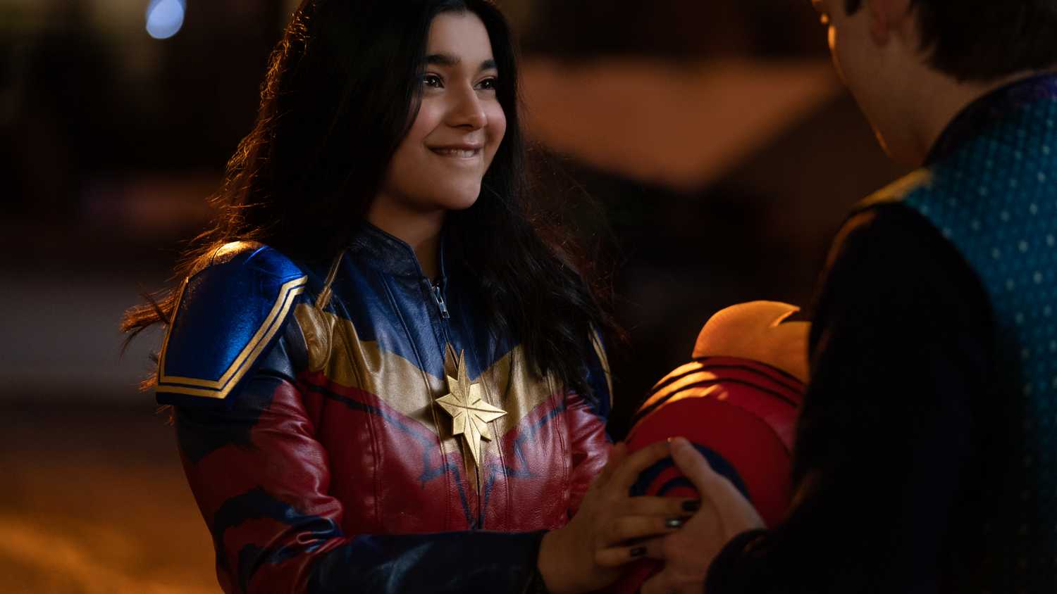 Kamala biting her lip in her Ms. Marvel cosplay
