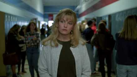 Laura Palmer walks down the hallway of her high school in Twin Peaks: Fire Walk with Me.