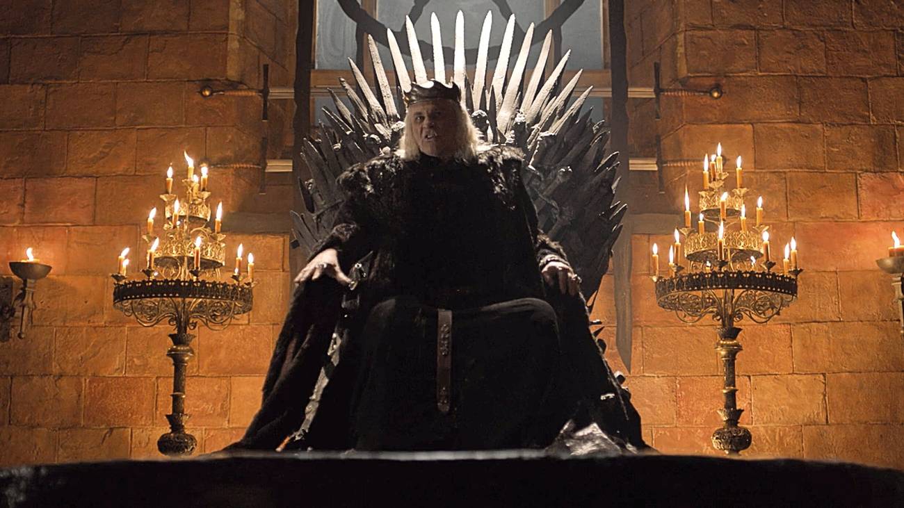 The Mad King Aerys Targaryen sits on the Iron Throne in Game of Thrones season 6.