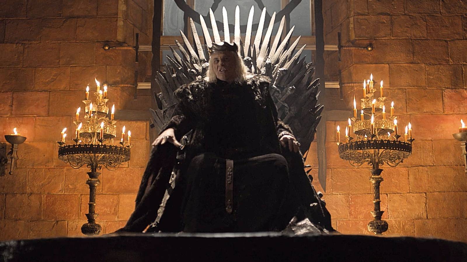 The Mad King Aerys Targaryen sits on the Iron Throne in Game of Thrones season 6.