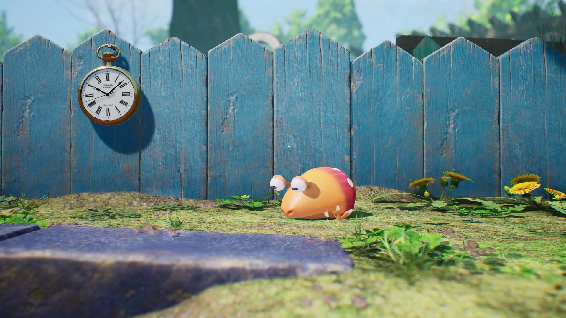 a yellow and red creature on the ground in Pikmin 4, with a stopwatch hanging on a fence behind it