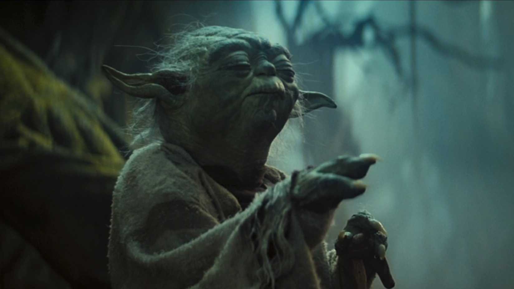 Yoda uses the Force to lift Luke’s X-Wing in a still from Star Wars: The Empire Strikes Back