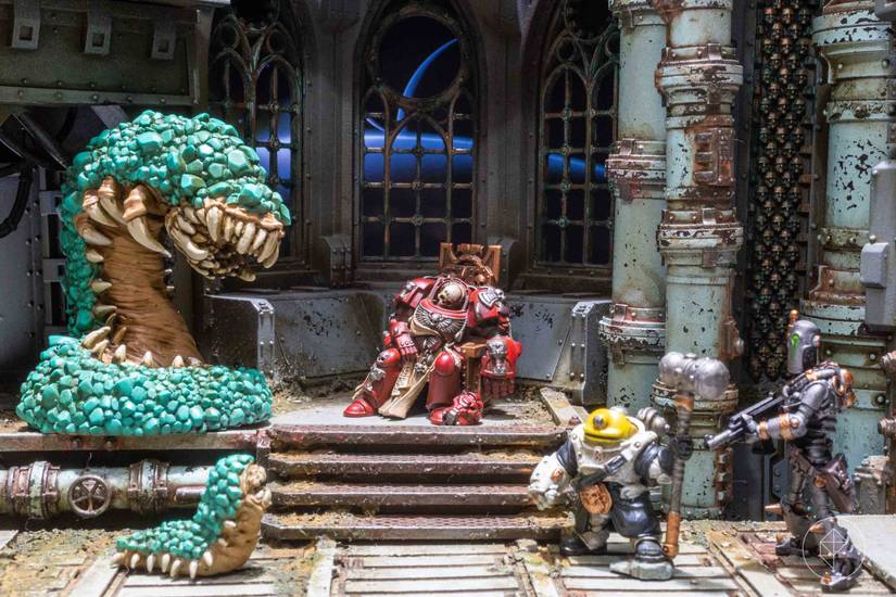 The full scene on the bridge of the gothic spacecraft. Warpbeasts confront the robotic explorers while the dead Space Marine sits in the background, irrelevant and implaccable at the same time. A dark moon rises in the background against ruined, cathedral-like windows.