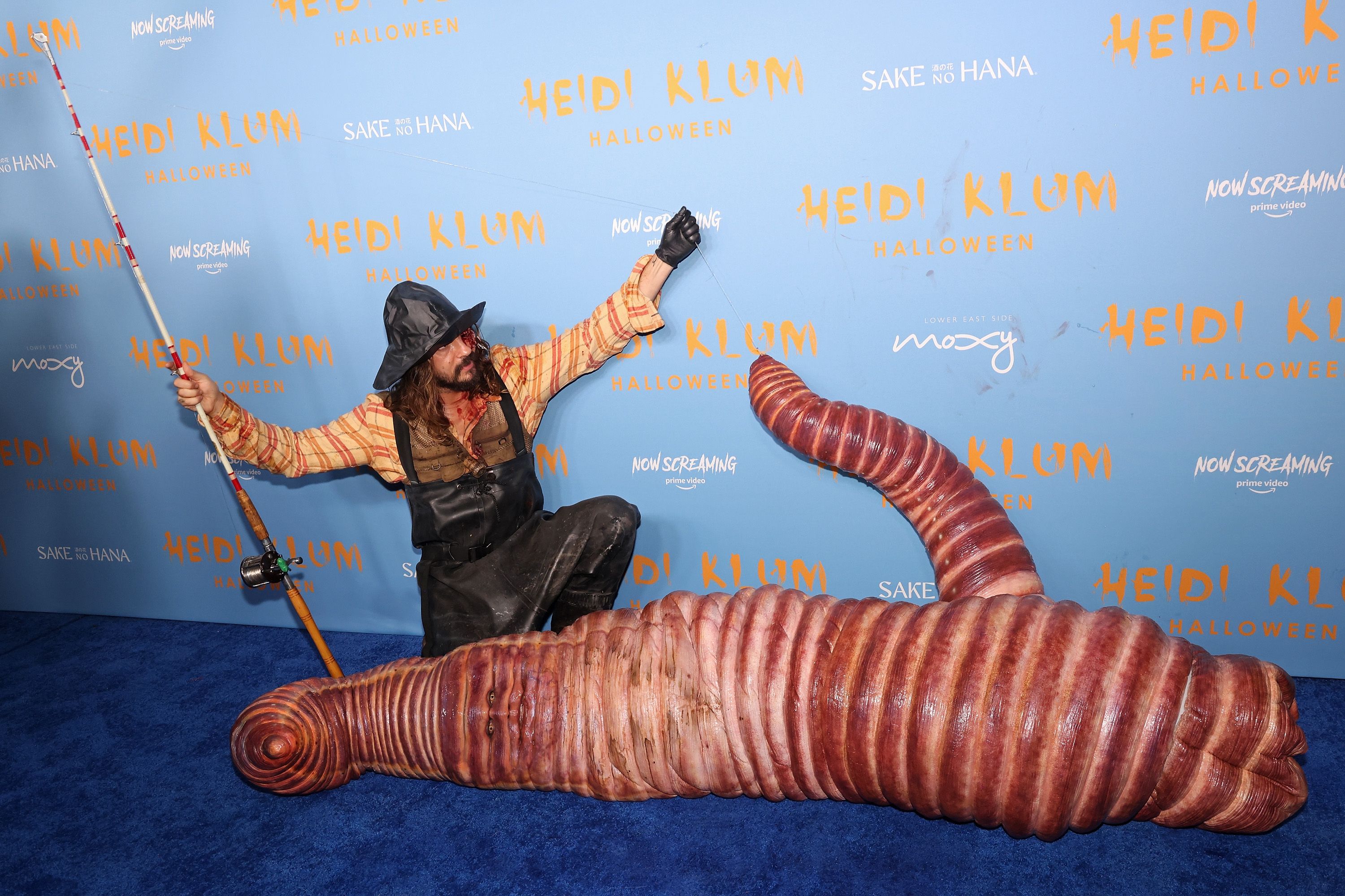 lady dressed as worm Heidi Klum's costume is the only Halloween outfit you need to see label_us_USA 2 DAY DELIVERY