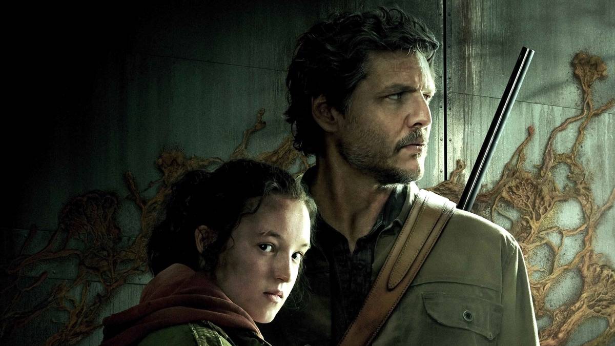Ellie (Bella Ramsey) and Joel (Pedro Pascal) stand together in promotional art for The Last of Us on HBO.